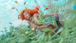 red_haired_mermaid_by_suilif_dejwx7n.jpg